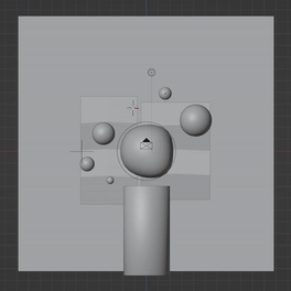 Blender viewport showing spheres and a cylinder in a grey scene